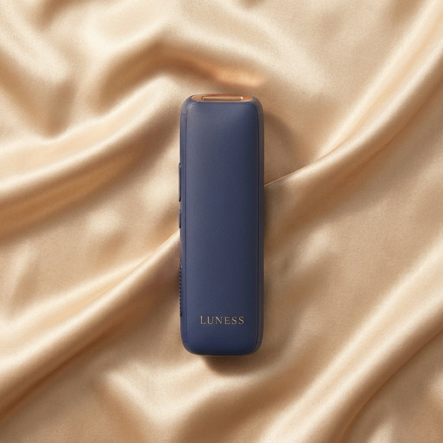 Luness RadiancePro IPL device on gold fabric